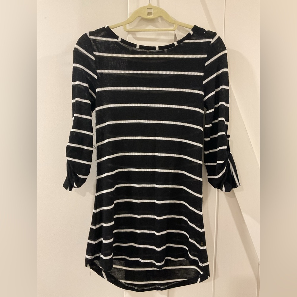 Stripped suit cover up with adjustable sleeves.